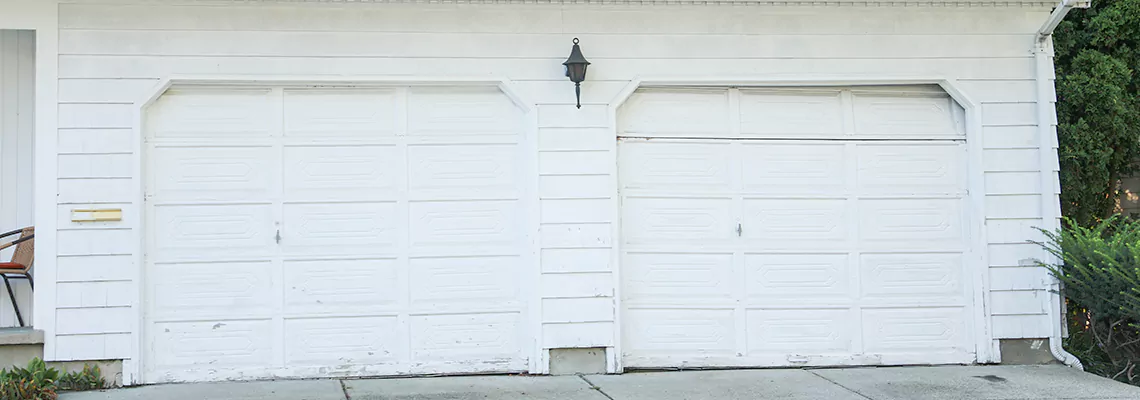 Roller Garage Door Dropped Down Replacement in Clearwater, FL